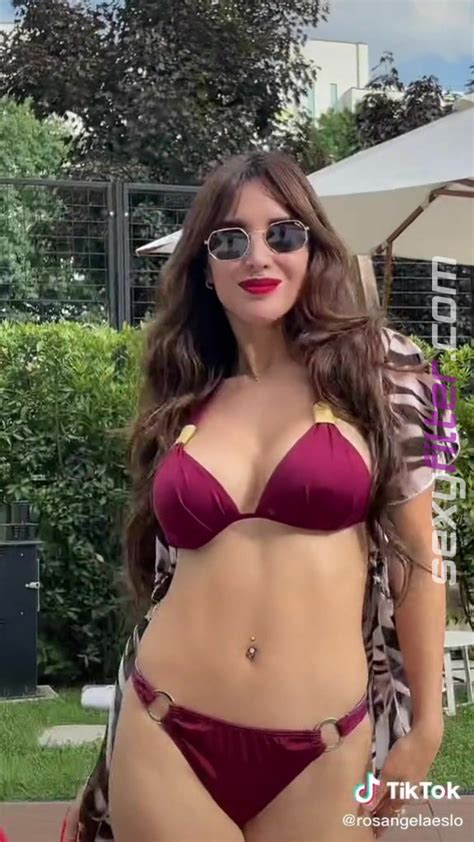 Cute Rosángela Espinoza Shows Cleavage in Red Bikini sexyfilter