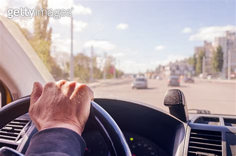 The Driver S Hands On The Steering Wheel Of The Car