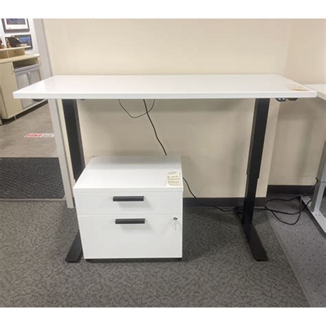 ADJUSTABLE HEIGHT DESK - Office Furniture Expo