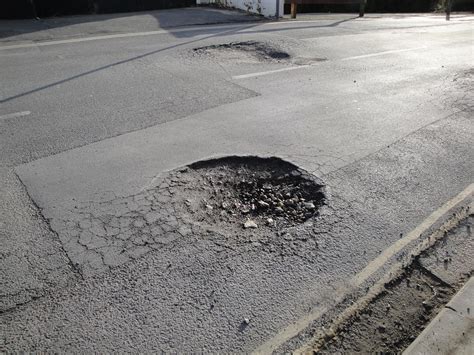 Have You Experienced Pothole Damage To Your Car