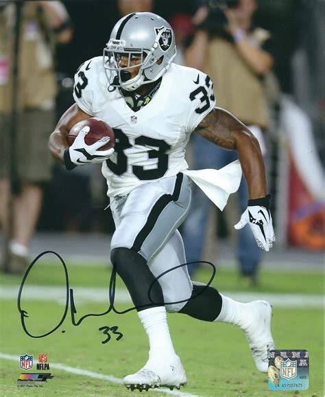 Autographed DEANDRE WASHINGTON 8X10 Oakland Raiders photo - Main Line