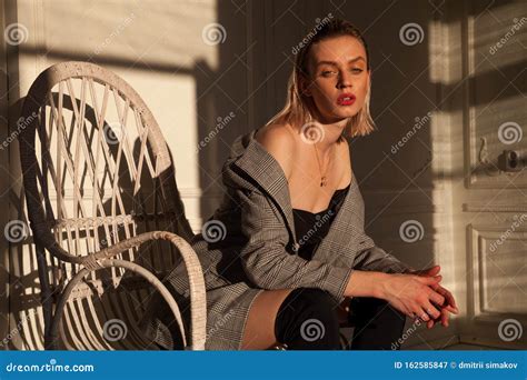 Portrait Of A Beautiful Fashionable Blonde Woman In Lingerie And Boots Stock Image Image Of