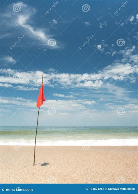Red flag on the beach stock image. Image of clear, danger - 138671287