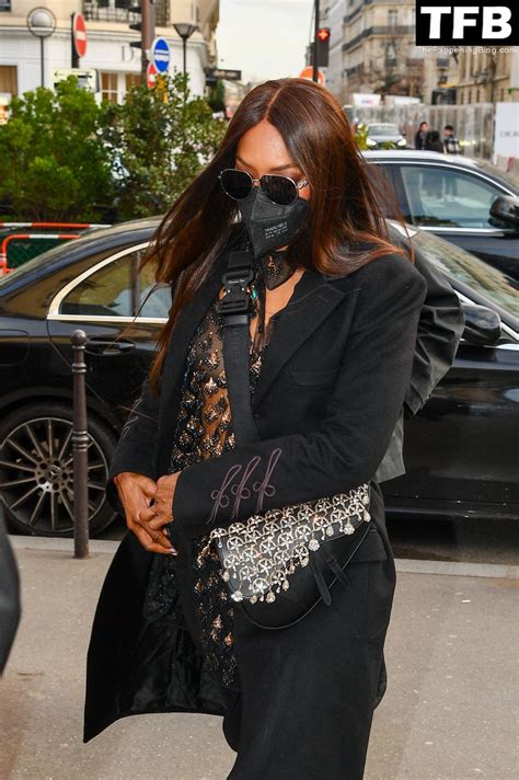 Naomi Campbell Flashes Her Nude Tits As She Attends The Dior Homme Show Fappening