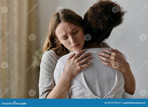 A Diverse Lesbian Couple Embraces In Stock Image Image Of Diversity Intimacy 327477813