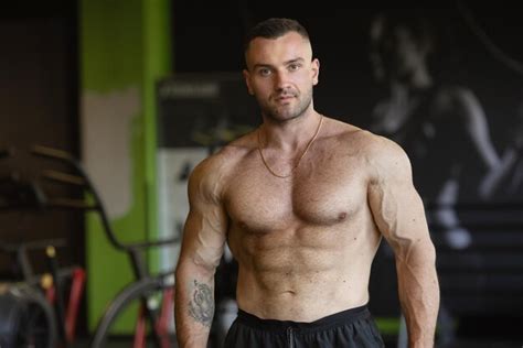 Premium Photo Muscular Man Working Out In Gym Strong Male Naked Torso Abs