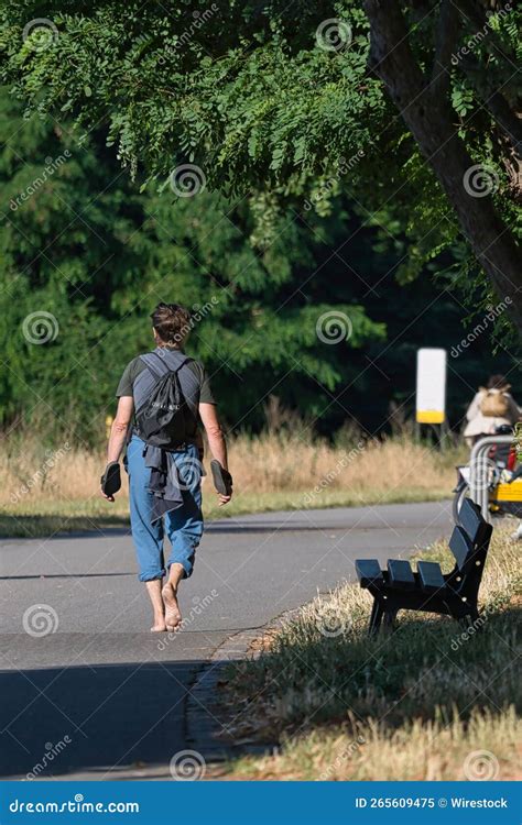 Man walking barefoot stock image. Image of outdoors - 265609475