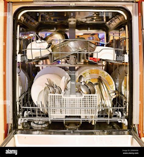 Close-up Of Old Dishwasher At Home Stock Photo - Alamy