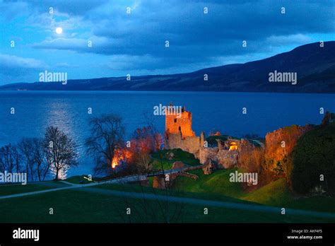 Urquhart Castle Loch Ness At Night With Full Moon Reflection On Water