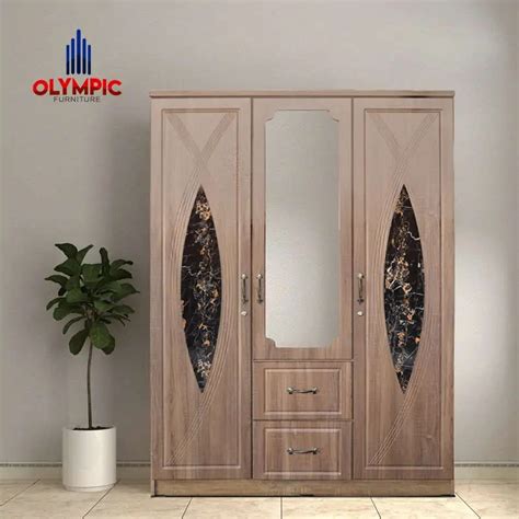 Lemari Pakaian Olympic Motif Ukiran Jati Chester Series Olympic Furniture