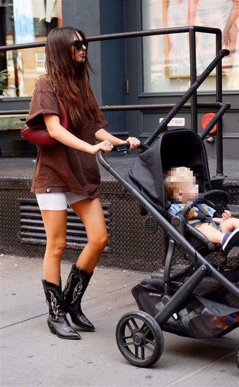 Emily Ratajkowski in a Brown Tee Goes for a Stroll with Her Baby Son