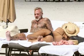 Gianluca Vacchi Is Exuding Serious Sex Appeal While Out In White Trunks During A Romantic