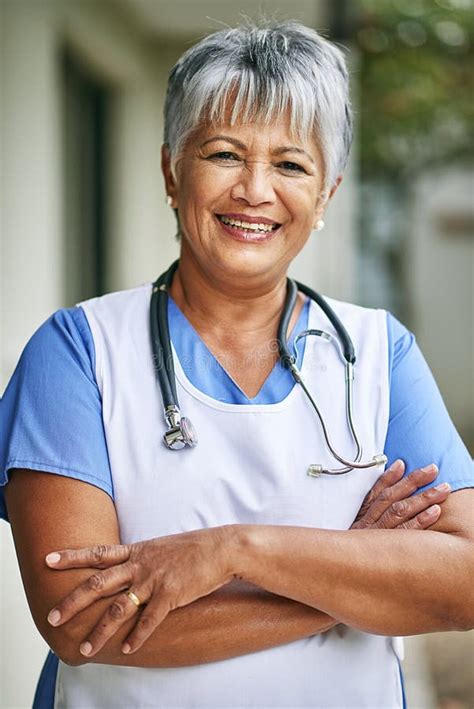 Caring For The Sick Is Her Calling Portrait Of A Mature Female Nurse Standing Outside Stock