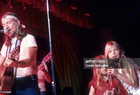 Closeup of Willie Nelson performing with daughters Paula Carlene and ...