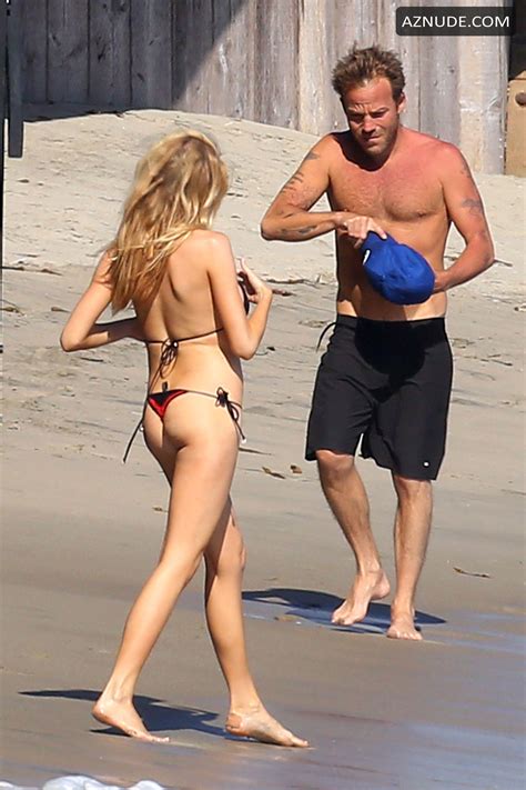 Charlotte Mckinney In A Bikini On A Beach In Malibu Aznude