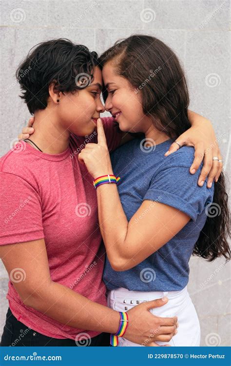 Latina Lesbian Couple Smiling And Hugging Outside Stock Photo Image Of Friends Lgtb