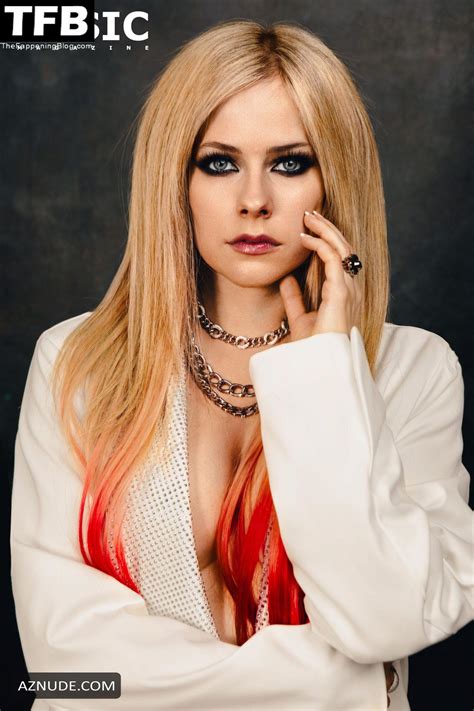 Avril Lavigne Sexy Poses Showing Off Her Hot Tits In A Photoshoot For