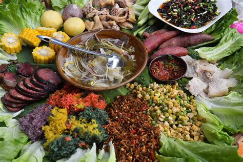 Ethnic Miao cuisine gets visitors into 'Sisters Festival' spirit - CGTN