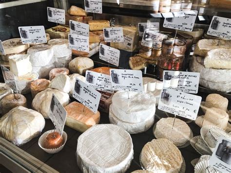 Many Different Types Of Cheese Are On Display