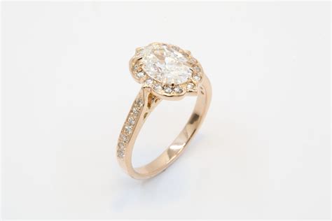 Custom Oval Diamond Engagement Ring in Rose Gold