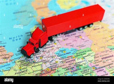 Truck with trailer on the Europe map Stock Photo - Alamy