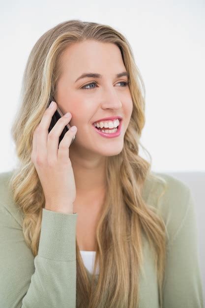 Premium Photo Smiling Pretty Blonde On The Phone