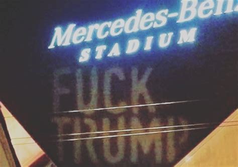 Protesters Project Fuck Trump Onto Football Stadium As President Arrives For College Football