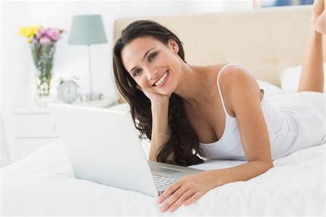 Premium Photo Happy Brunette Using Her Laptop