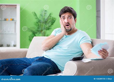 young man struggling  personal finance  bills stock image