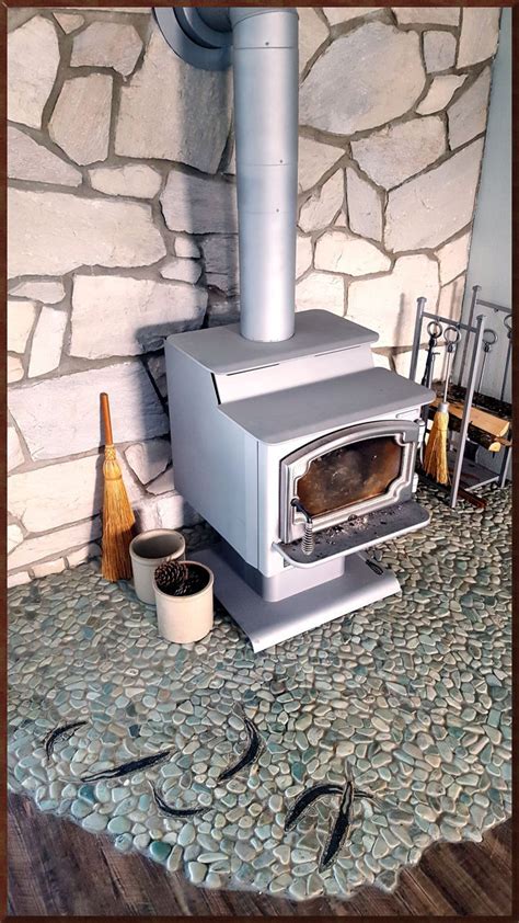 King salmon ceramic tiles around wood stove. | Дом, Мозаика, Мебель