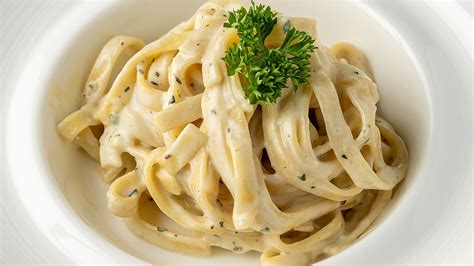 The Ingredient That Westernized Traditional Alfredo Sauce