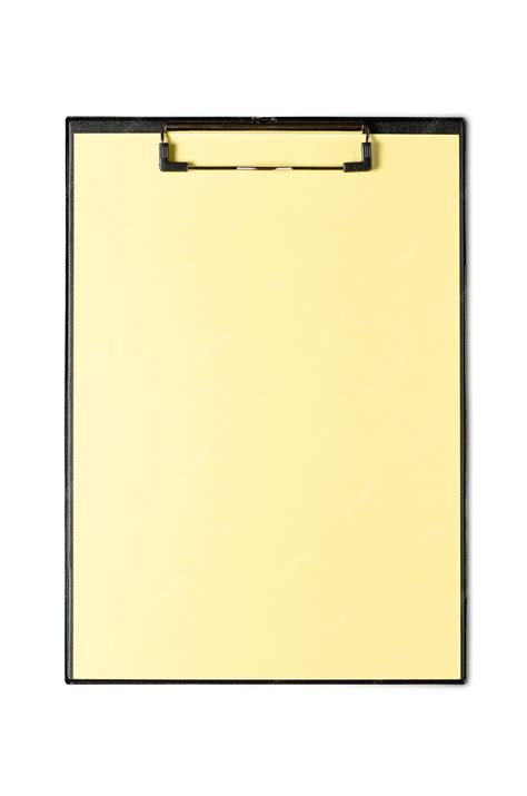 Premium Photo | A clipboard with a sheet of yellow paper isolated on white