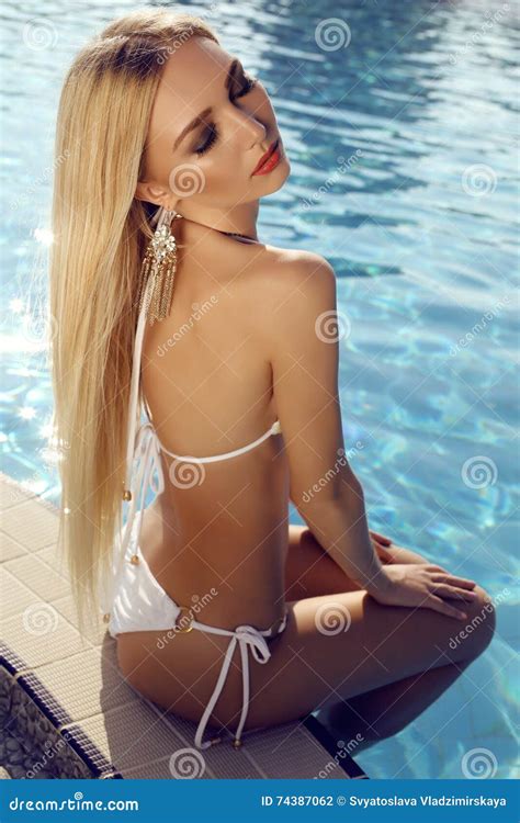 Gorgeous Sensual Woman With Blond Hair In Elegant Bikini Stock Photo