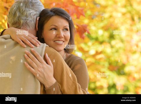 Mature Woman Hugging Father Stock Photo Alamy