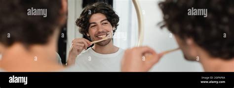 Cheerful Gay Couple Brushing Teeth In Bathroom Banner Stock Photo Alamy