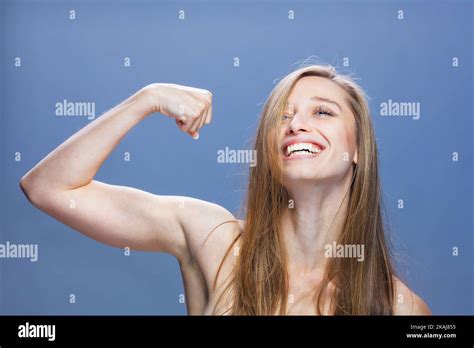 Brunette Girl Showing Muscles Hi Res Stock Photography And Images Alamy