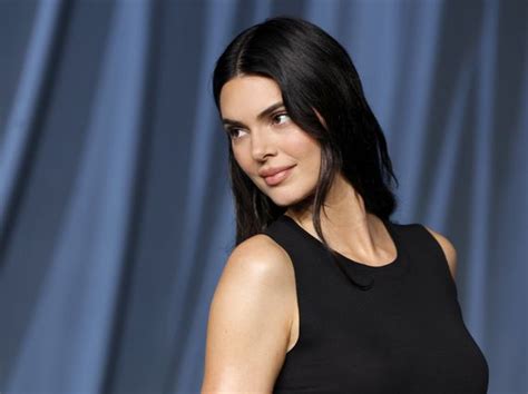 Kylie Jenner Pairs Tiny Gold Bikini With Diamond Necklace