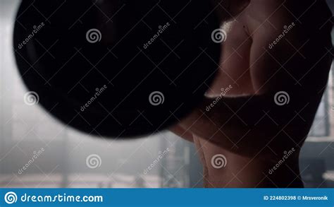 Powerlifter Doing Weightlifting Exercise Man With Naked Torso Lifting Weights Stock Photography