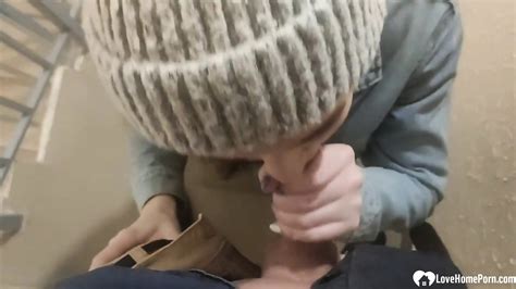 Slutty Babe Gets On Her Knees To On The Staircase