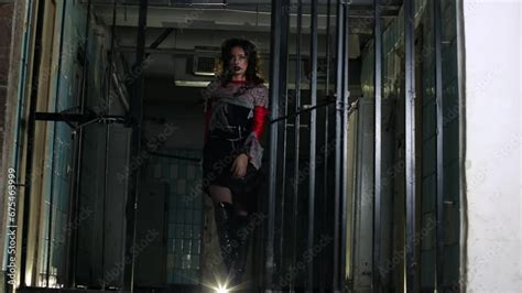 Brunette Girl In Halloween Style A Woman In Prison A Scary Scene Terrible Darkness Torn