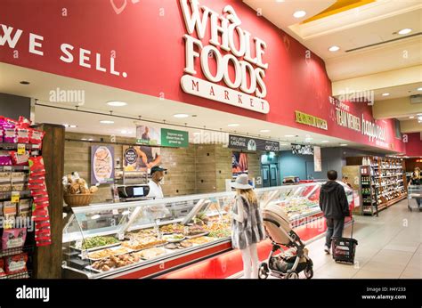 People Shopping In Whole Foods Market In Kensington High Street London