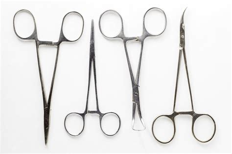 Premium Photo | Surgical hemostatic medical clamps made of stainless ...