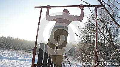 Pull Ups With A Naked Torso Outdoors In Winter Stock Video Video Of Outdoors Freezings