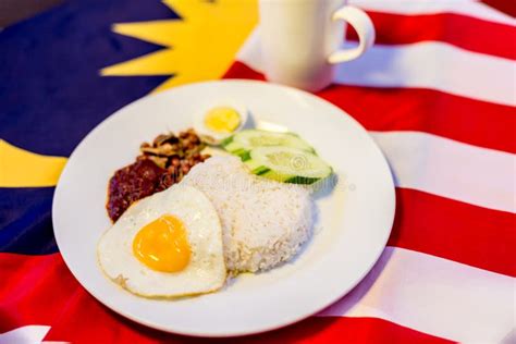 Malaysian Breakfast Nasi Lemak And Teh Tarik On Malaysia Flag Stock