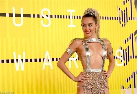 Vma Host Miley Cyrus Puts Her Naked Ambition On Show In Bare Breasted Outfit Daily Mail