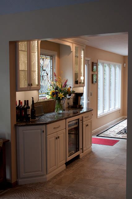 White Kitchen With Contrasting Island Traditional Kitchen