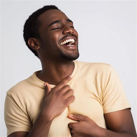 A Man Laughing With His Hand Tapping His Chest Premium AI Generated Image