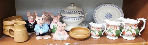 Lot 287 A Set Of Five Natwest Piggy Banks A