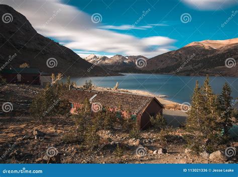 Saddlebag Lake Resort Sits Nestled in the Snow Covered Peaks Stock Photo - Image of forest ...