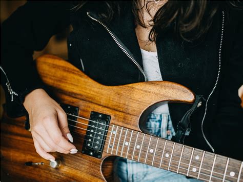 Strumming Through History Who Invented The Electric Guitar And When It